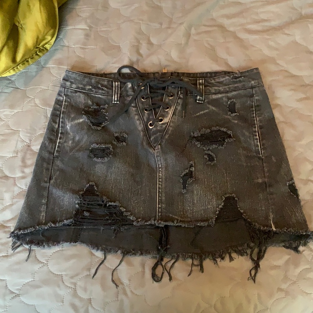 Black distressed denim skirt